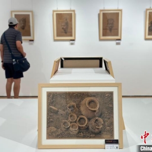 丝路文物“素描师”：38载深耕让汗青“呼吸”